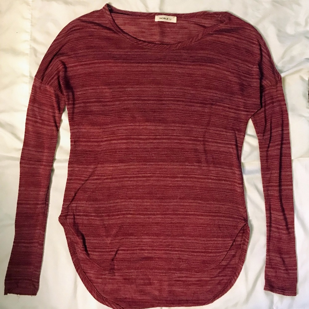 Long-sleeve cotton scoop-neck w/ tapered bottom.